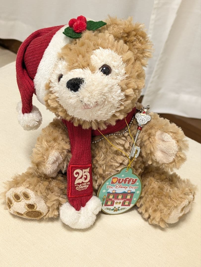 ダッフィー クリスマス オルゴールぬいぐるみ&25周年のチャーム セット