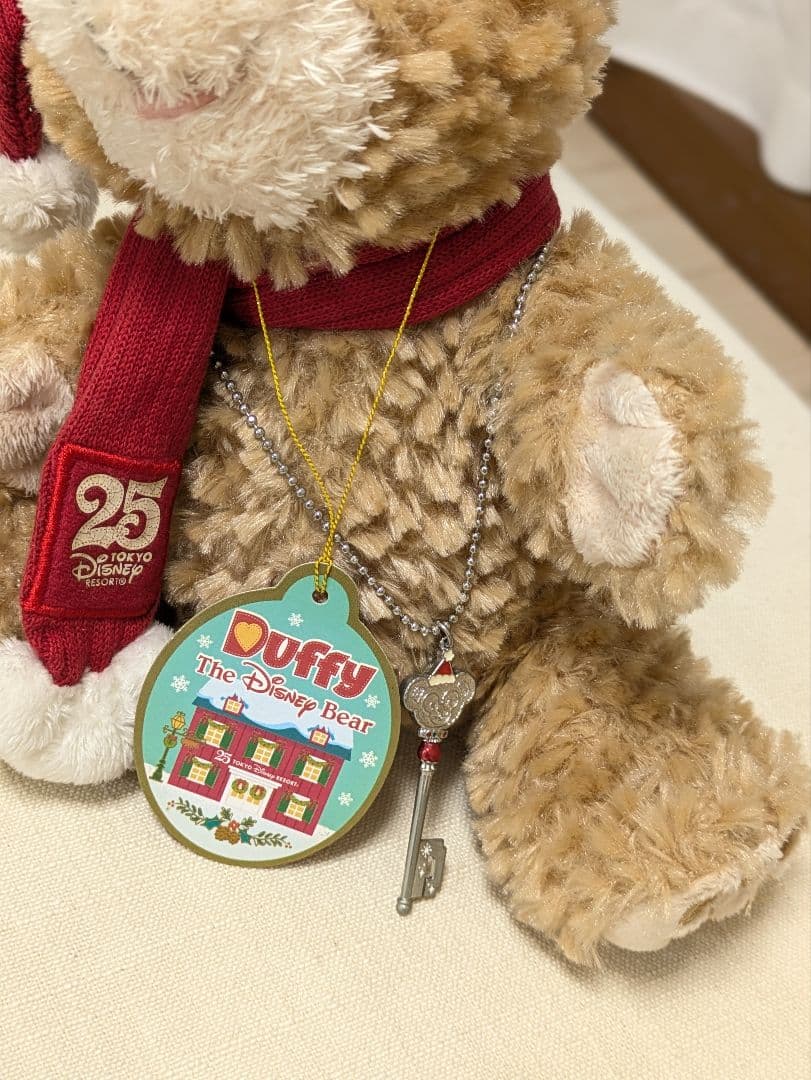 ダッフィー クリスマス オルゴールぬいぐるみ&25周年のチャーム セット