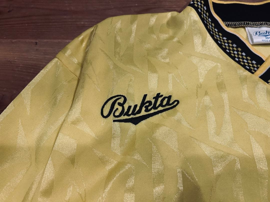 ユニフォーム 古着 90s Bukta バクタ UK製 黄色 Vネック 40