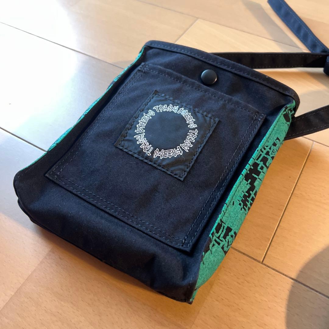 Trash breeds trash ポーチ green