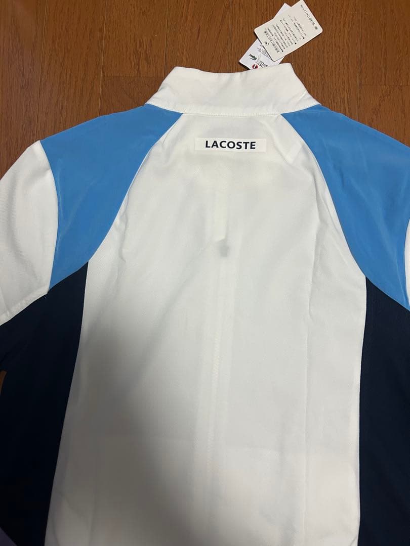 Lacoste マルチカラー ジャケットとネイビーパンツ セット