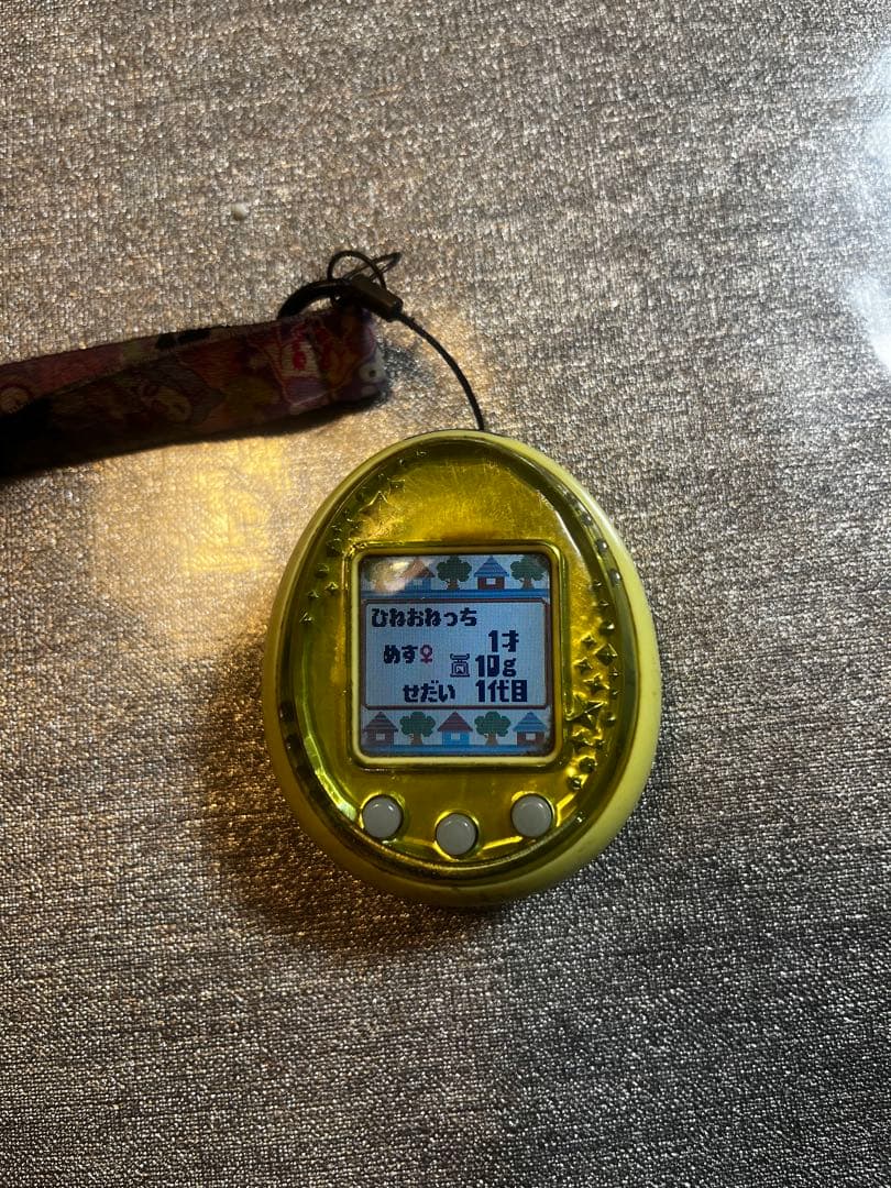 Tamagotchi イエロー キャラクター柄ストラップ