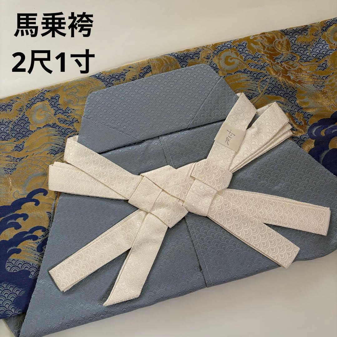 (7-138)馬乗袴　2尺1寸　水色　龍柄　金