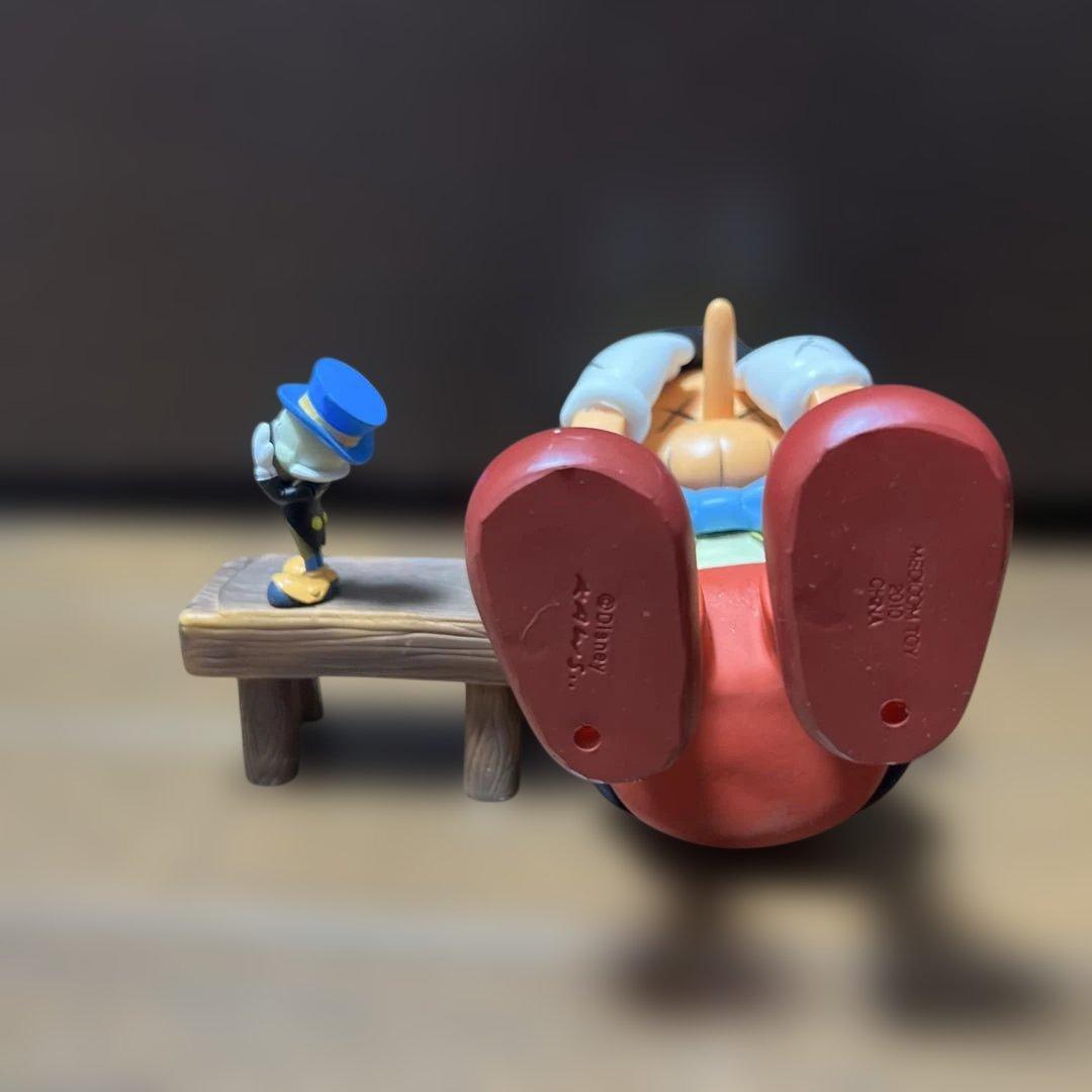 最終値下げカウズ KAWS Pinocchio & Jiminy Cricket