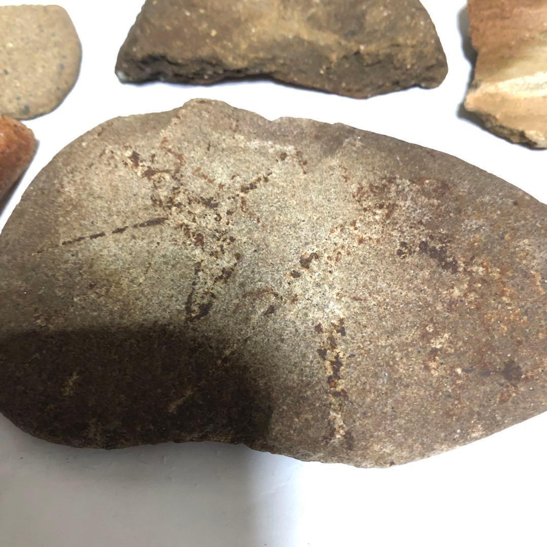 縄文時代の石皿、石斧、土器破片