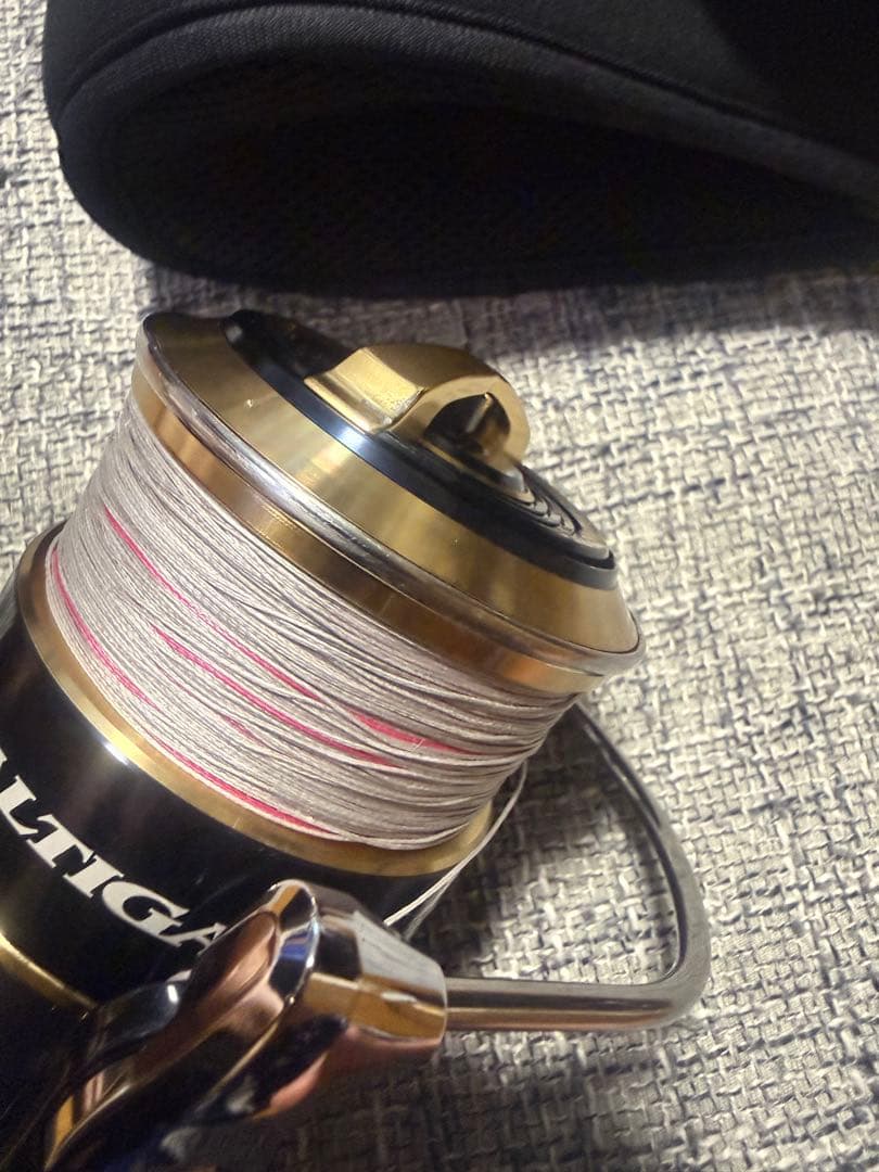 極上品20ソルティガ14000XHスピニングリール 巻き軽、ケース付き箱無し