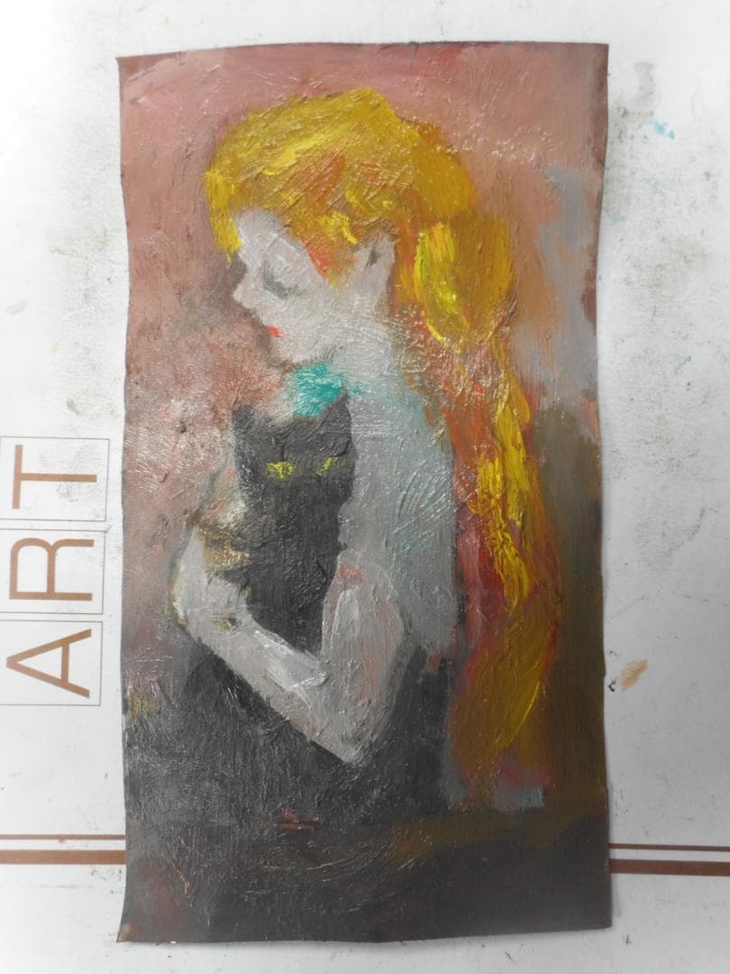 猫と女