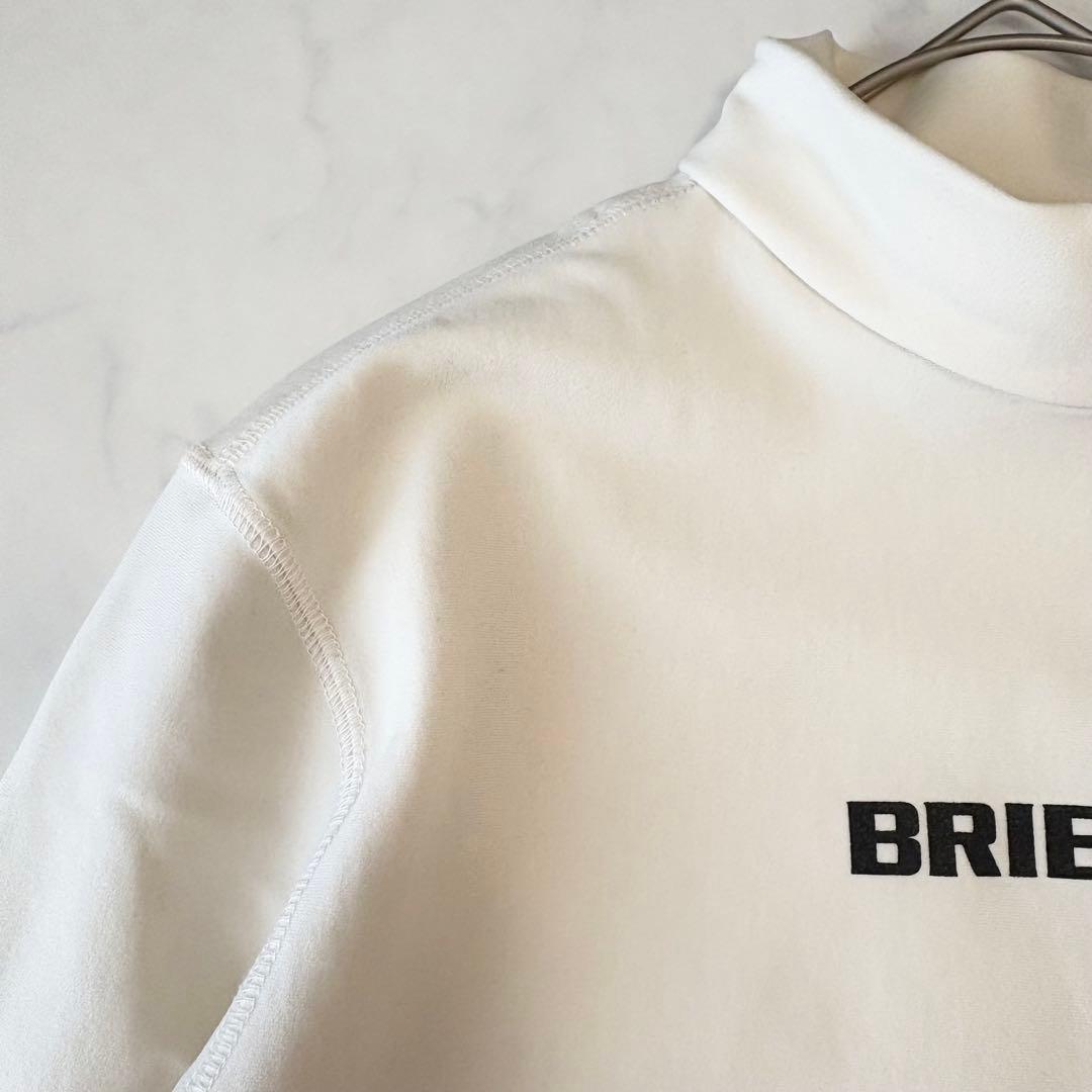 【最終価格】BRIEFING モックネック 裏起毛 ホワイト ゴルフレディース